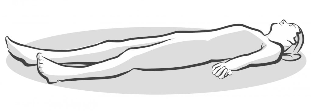total relaxation in yoga corpse pose (asana) pose