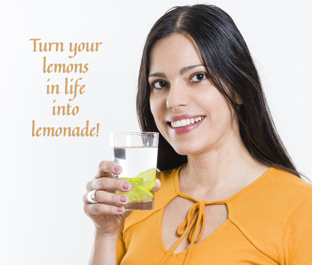turn lemons into lemonade- woman holding glass
